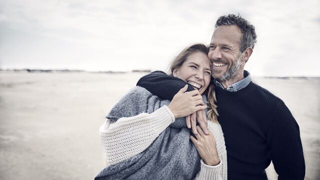 Couple laughing at the beach-SMALL